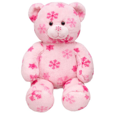 A forma e o bicho de pelúcia cor-de-rosa do urso de peluche brincam o material macio da forma