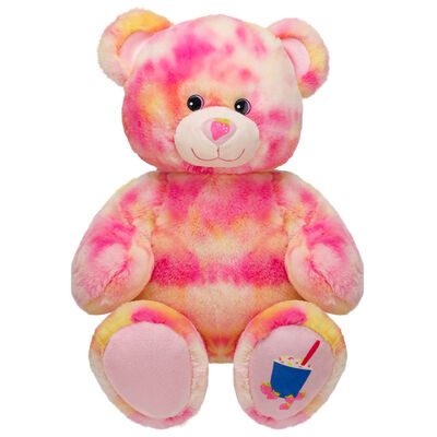 A forma e o bicho de pelúcia cor-de-rosa do urso de peluche brincam o material macio da forma