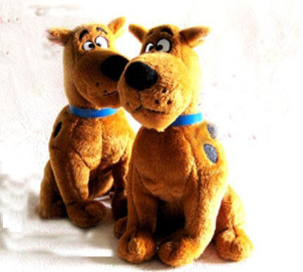 O luxuoso relativo à promoção dos desenhos animados brinca o doo scooby enchido, pose de assento