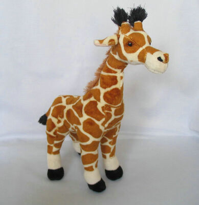 Brinquedos bonitos do bicho de pelúcia do girafa de Brown que sentam e que estão a pose