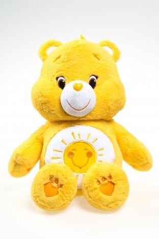O cuidado amarelo carrega brinquedos do luxuoso dos desenhos animados dos bichos de pelúcia para meninas, bebês