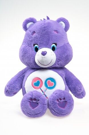 O cuidado original carrega brinquedos do luxuoso dos desenhos animados dos bichos de pelúcia, roxo/azul/amarelo